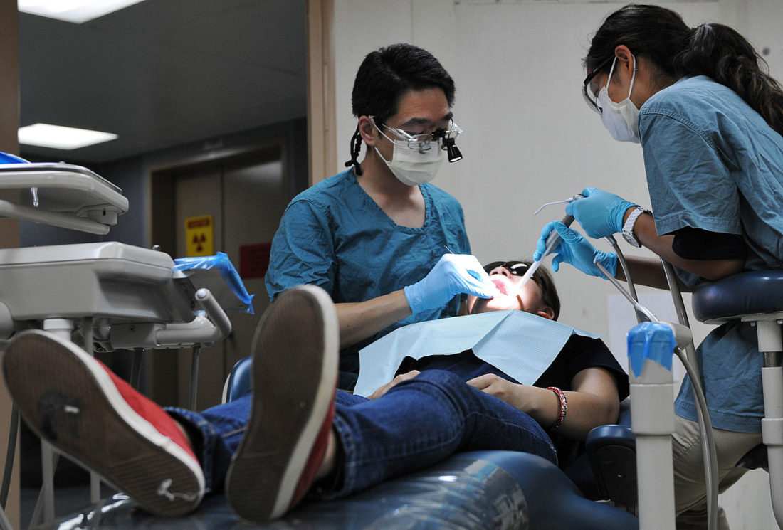 1280px-Flickr_-_Official_U.S._Navy_Imagery_-_A_dentist_performs_a_root_canal.